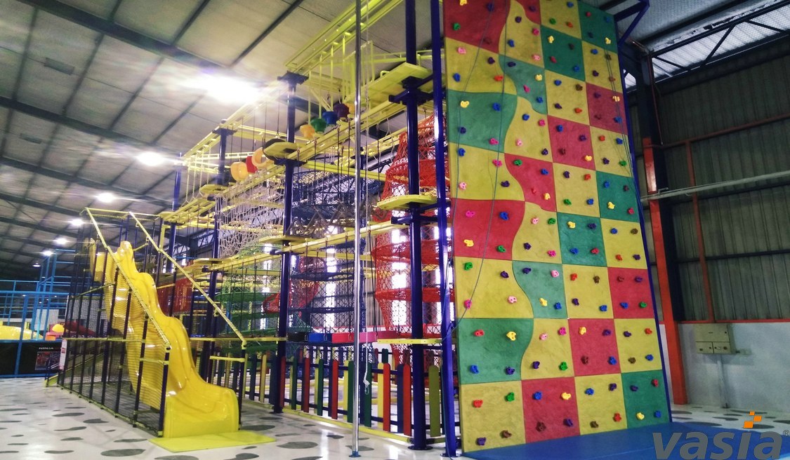  What are the location requirements for gigantic slide in the indoor play place?